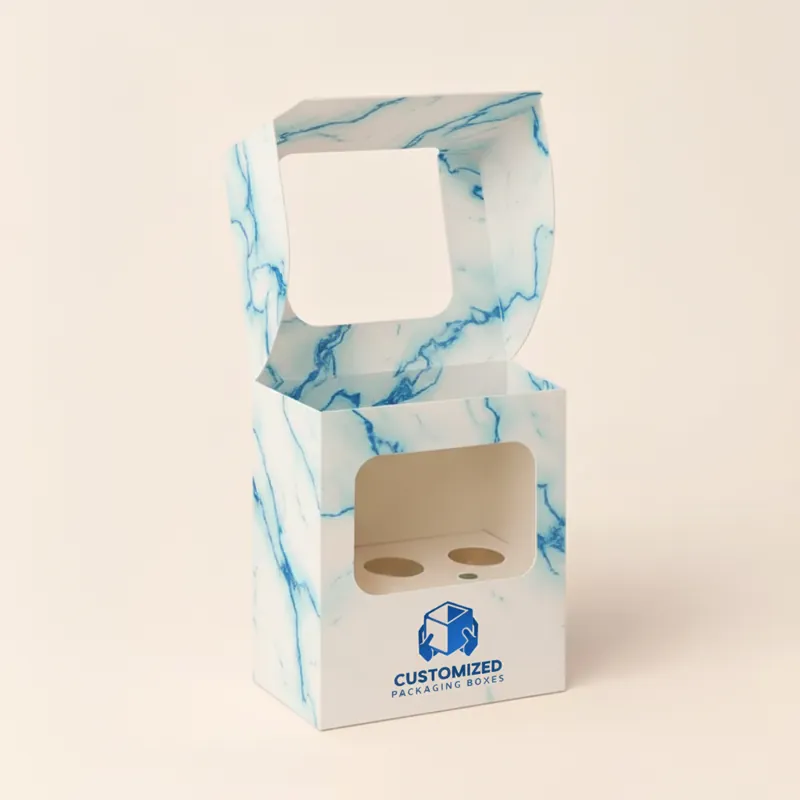 A cake pop box with a clear window displays colorful cake pops, showcasing a charming and appetizing dessert packaging design.
