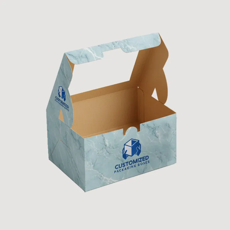 A dessert box with a clear lid reveals neatly arranged, tempting treats inside, hinting at delicious indulgence.
