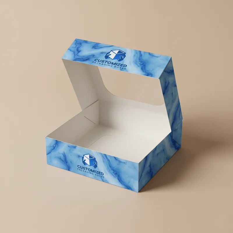 A brown cardboard pastry or baked goods box with a hinged lid, suggesting a take-out container.
