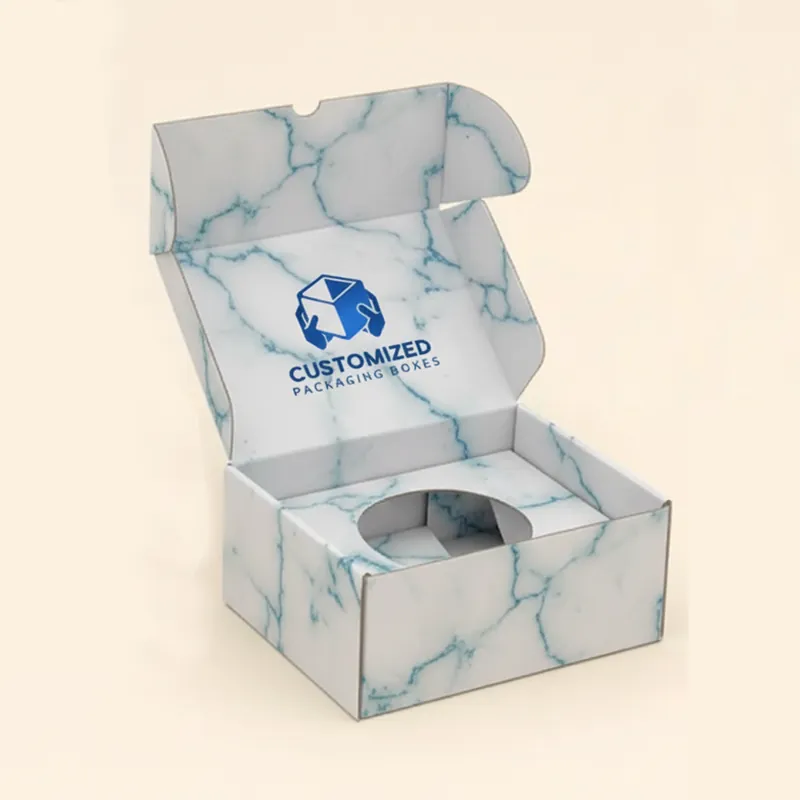 A retail candle box with inserts has a kraft paper finish, displaying candle storage and branding.
