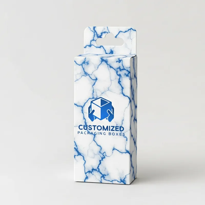 A small, rectangular mascara box in a minimalist style, suggesting a beauty or cosmetic product.
