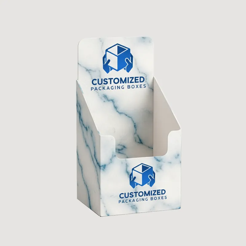 Sleek black mascara packaging box with silver accents, likely containing the product, showcasing modern design and branding.
