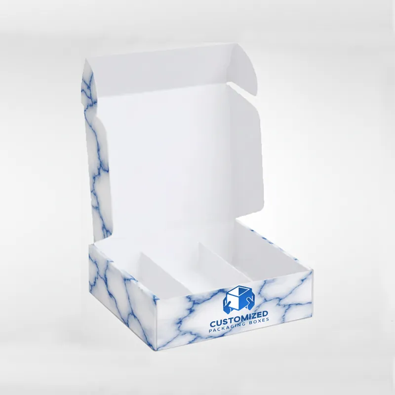 A clear, lidded plastic sushi box holds assorted sushi rolls, showcasing the packaged meal ready for takeout or retail.
