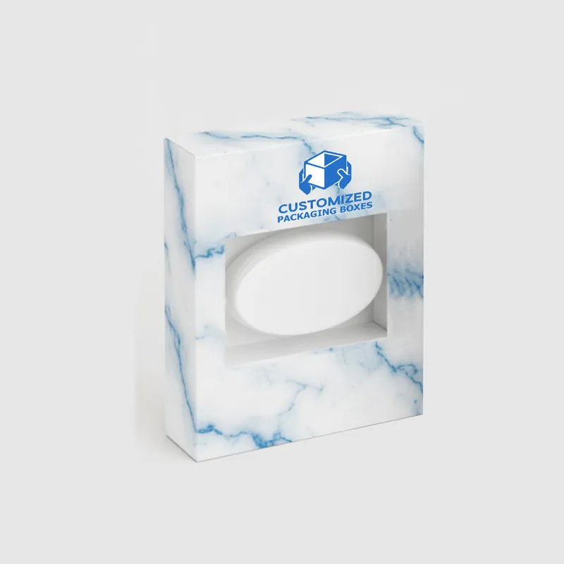 A close-up of a stylized beard brush box, showcasing its modern, masculine packaging design.
