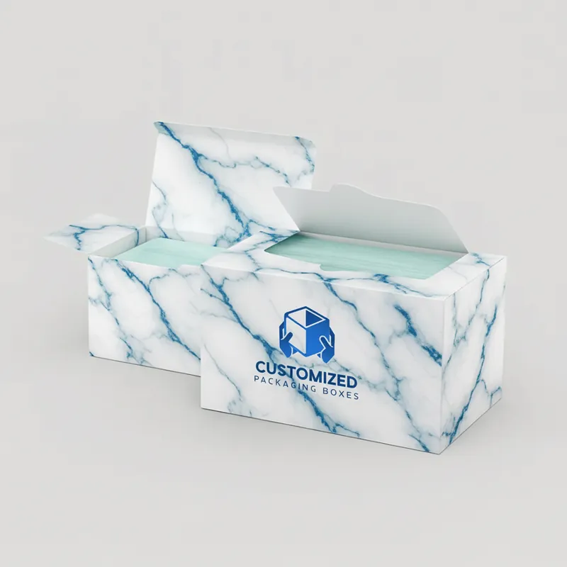 A blue and white surgical mask box features a mask graphic, product name, and manufacturer logo, conveying a sense of medical protection.
